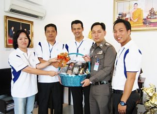 Pol. Col. Nanthawut Suwanla-ong (2nd right), superintendent of Pattaya City Police, welcomed the management team from the Hilton Pattaya who came by to wish him a happy New Year. (l-r) Napatsorn Narongin, human resources manager, Montree Sattham, director of human resources, Norrarat Suebprasong, security manager and Dhaninrat Klinhom, marketing & communications manager.